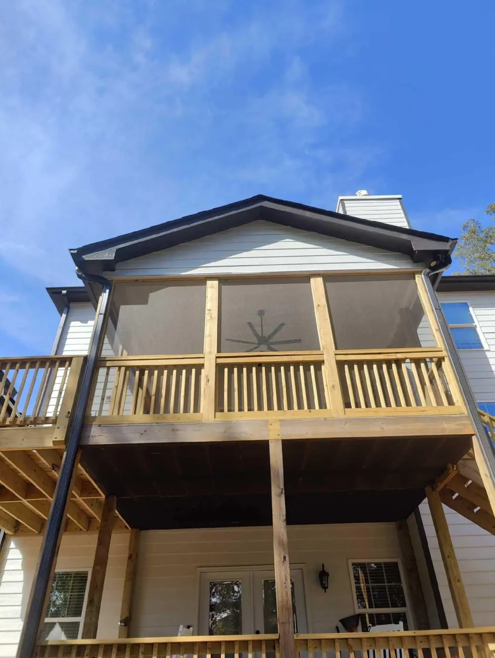 Screened-in porch with deck