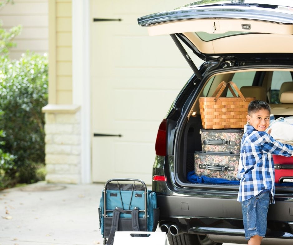 a boy with a loaded car- leaving home for the summer